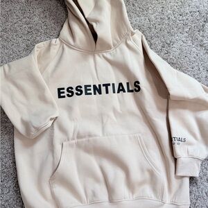 Essentials Men's Cream Hoodie with Black Logo